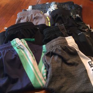 Boys Nike and UA Dri Fit Med shorts.